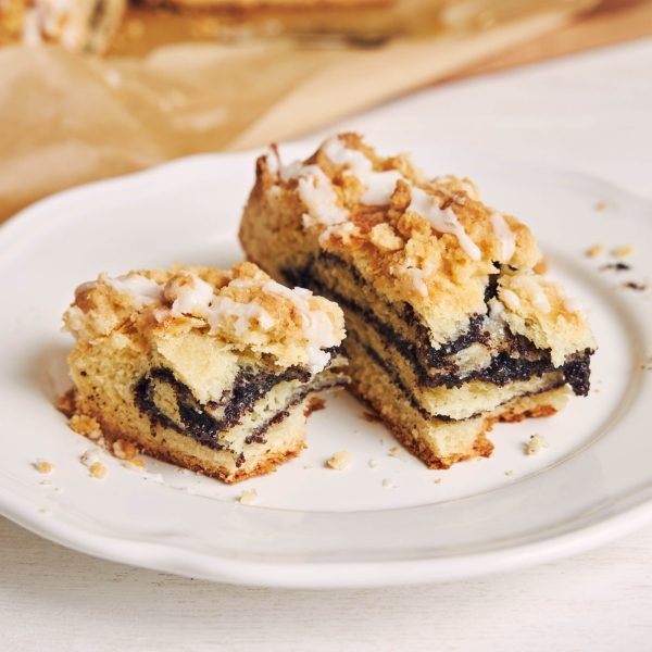 A vertical shot of a poppy seed roll